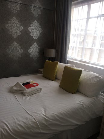 Imagen de la habitación del Hotel The Star. Foto 8