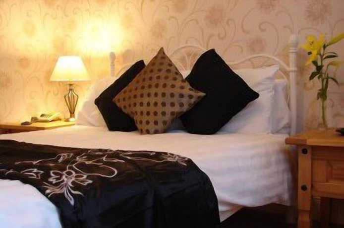 Imagen de la habitación del Hotel The Star. Foto 11