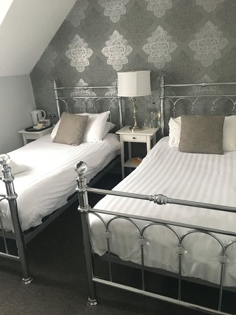 Imagen de la habitación del Hotel The Star. Foto 12