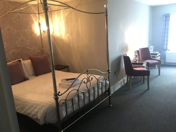 Imagen de la habitación del Hotel The Star. Foto 15