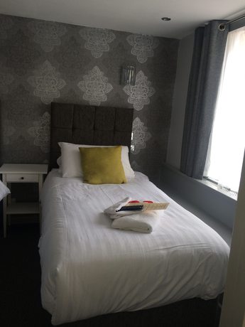 Imagen de la habitación del Hotel The Star. Foto 17