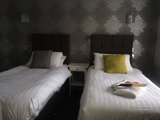 Imagen de la habitación del Hotel The Star. Foto 18