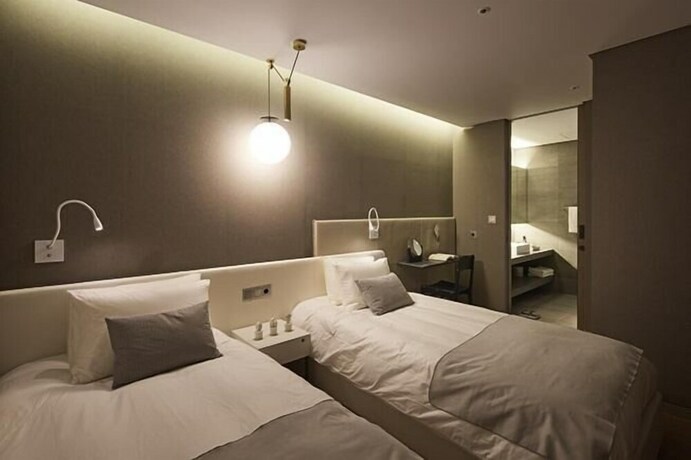 Imagen de la habitación del Hotel The StarHue Resort. Foto 8