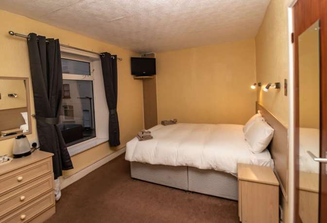 Imagen de la habitación del Hotel The Starlux. Foto 3
