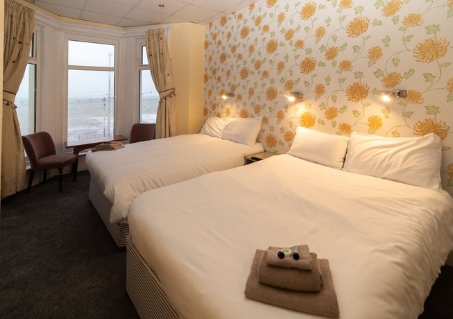 Imagen de la habitación del Hotel The Starlux. Foto 4