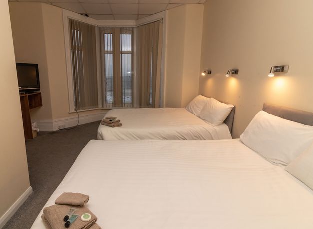 Imagen de la habitación del Hotel The Starlux. Foto 12