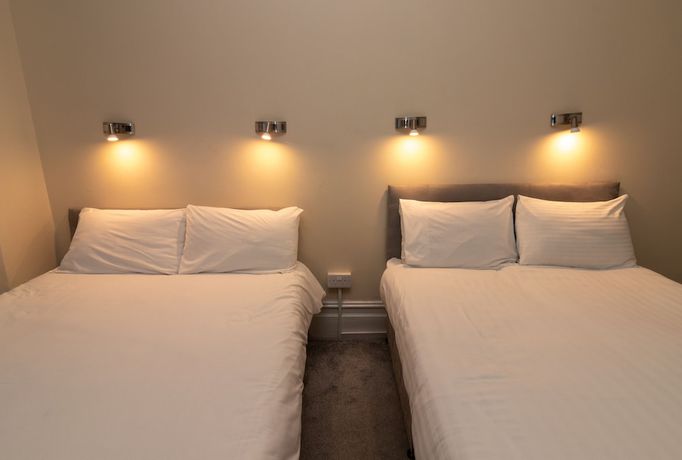 Imagen de la habitación del Hotel The Starlux. Foto 14