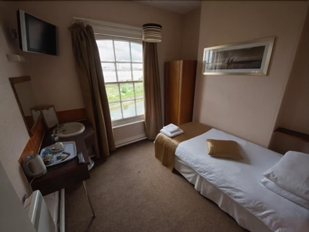 Imagen de la habitación del Hotel The Station. Foto 6