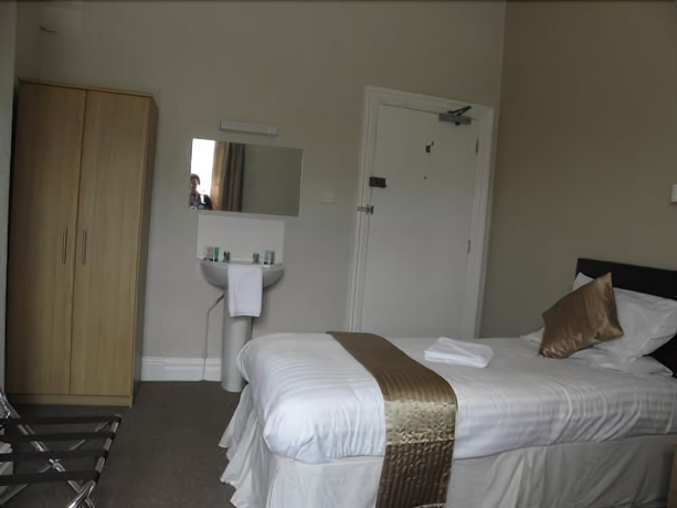 Imagen de la habitación del Hotel The Station. Foto 7