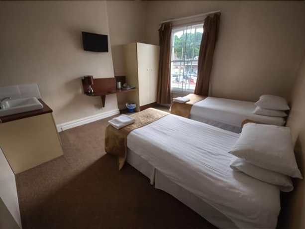 Imagen de la habitación del Hotel The Station. Foto 8