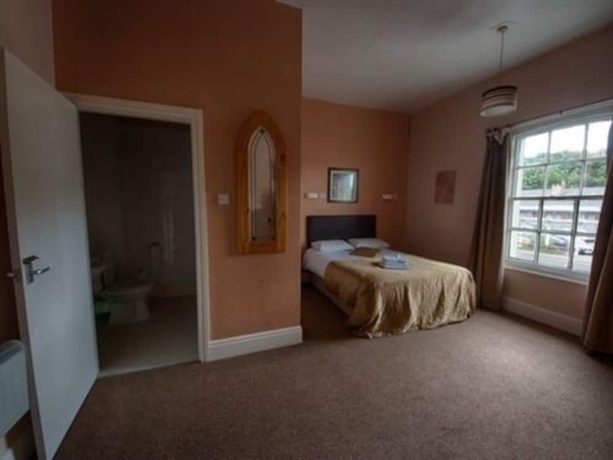 Imagen de la habitación del Hotel The Station. Foto 13