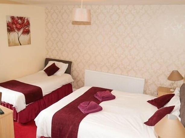 Imagen de la habitación del Hotel The Station. Foto 5