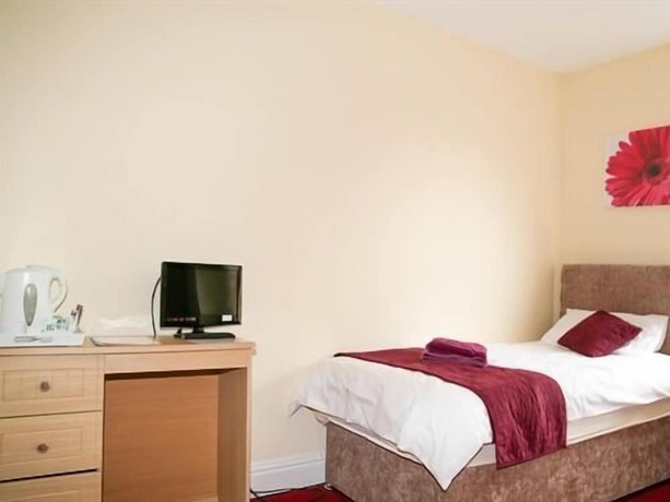 Imagen de la habitación del Hotel The Station. Foto 10