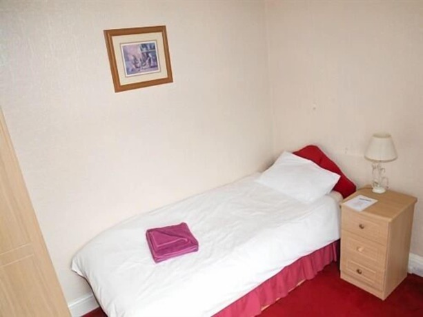 Imagen de la habitación del Hotel The Station. Foto 11