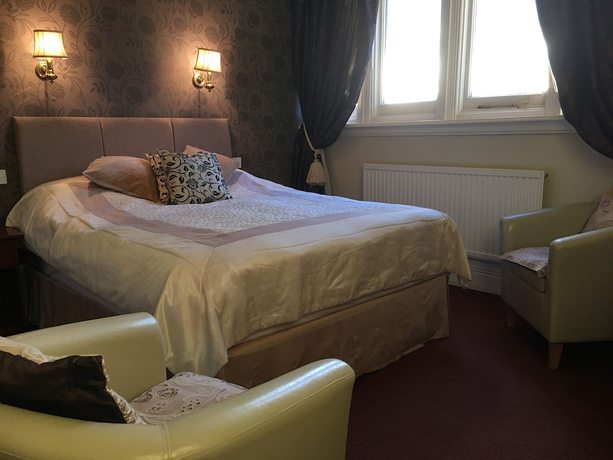 Imagen de la habitación del Hotel The Station. Foto 18