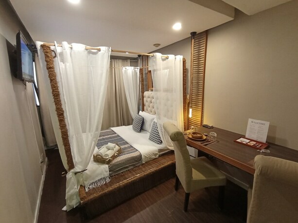 Imagen de la habitación del Hotel The Staycation - Boutique Rooms. Foto 12