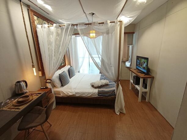 Imagen de la habitación del Hotel The Staycation - Boutique Rooms. Foto 13