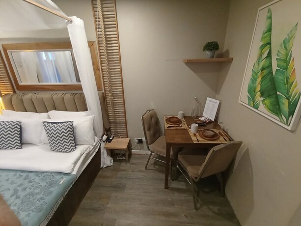 Imagen de la habitación del Hotel The Staycation - Boutique Rooms. Foto 18