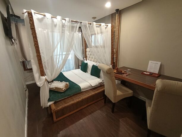 Imagen de la habitación del Hotel The Staycation - Boutique Rooms. Foto 20