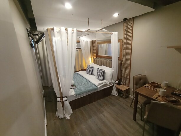 Imagen de la habitación del Hotel The Staycation - Boutique Rooms. Foto 23