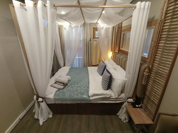 Imagen de la habitación del Hotel The Staycation - Boutique Rooms. Foto 33