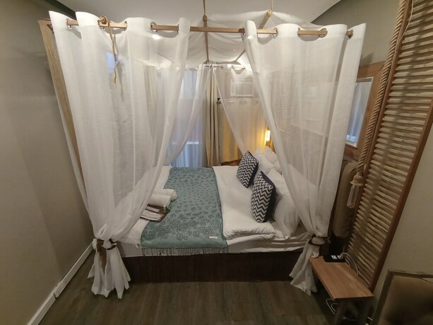 Imagen de la habitación del Hotel The Staycation - Boutique Rooms. Foto 36