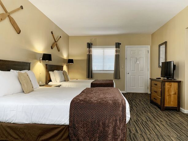 Imagen de la habitación del Hotel The Stone Gate Resort. Foto 16