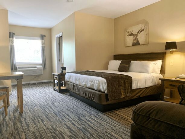Imagen de la habitación del Hotel The Stone Gate Resort. Foto 17