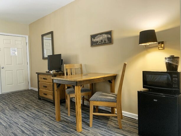 Imagen de la habitación del Hotel The Stone Gate Resort. Foto 18