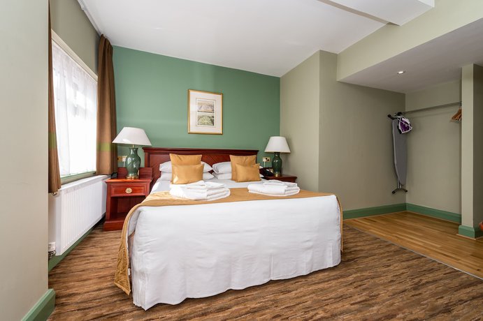 Imagen de la habitación del Hotel The Stones. Foto 9
