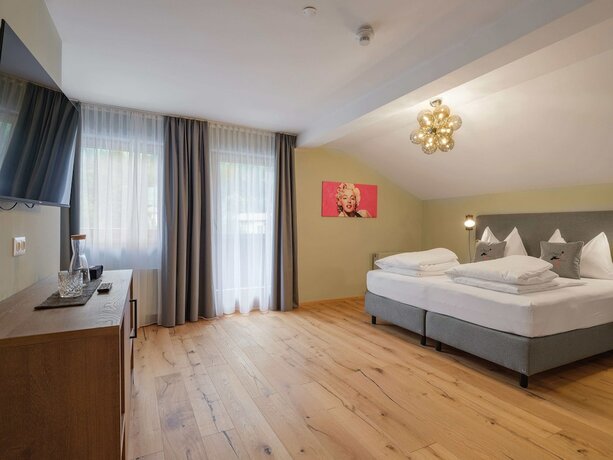 Imagen de la habitación del Hotel The Storks Boutique Bad Hofgastein. Foto 11