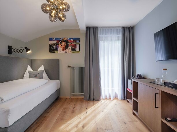 Imagen de la habitación del Hotel The Storks Boutique Bad Hofgastein. Foto 14