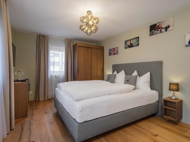 Imagen de la habitación del Hotel The Storks Boutique Bad Hofgastein. Foto 17