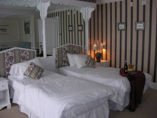 Imagen de la habitación del Hotel The Stowehof. Foto 11
