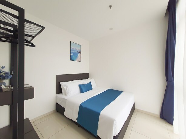 Imagen de la habitación del Hotel The Straits Suites And Residences. Foto 14