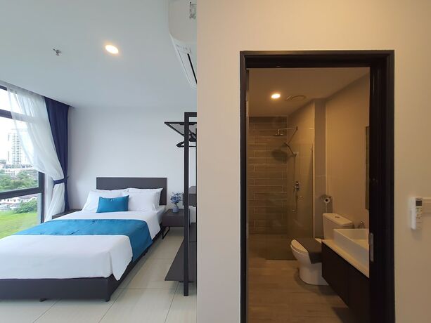 Imagen de la habitación del Hotel The Straits Suites And Residences. Foto 18