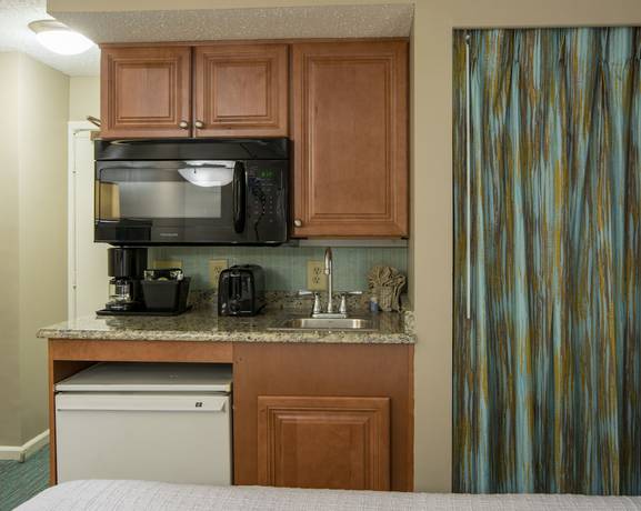 Imagen de la habitación del Hotel The Strand - A Boutique Resort. Foto 6