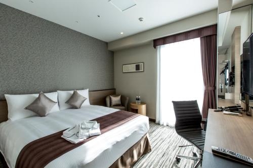 Imagen de la habitación del Hotel The Strings Nagoya. Foto 6