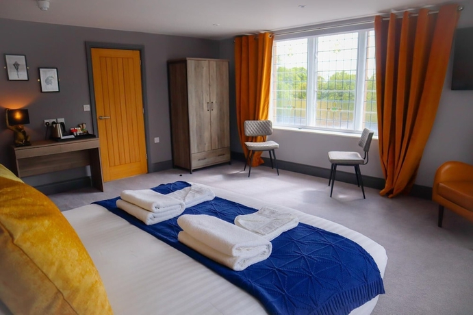 Imagen de la habitación del Hotel The Strutt Arms. Foto 9
