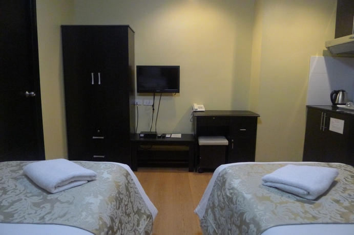 Imagen de la habitación del Hotel The Studio 18 Residences. Foto 3