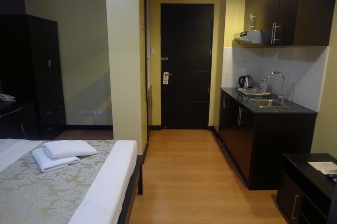 Imagen de la habitación del Hotel The Studio 18 Residences. Foto 4