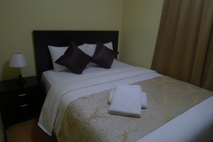 Imagen de la habitación del Hotel The Studio 18 Residences. Foto 8