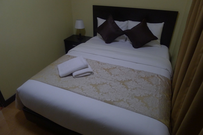 Imagen de la habitación del Hotel The Studio 18 Residences. Foto 10