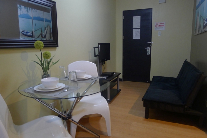 Imagen de la habitación del Hotel The Studio 18 Residences. Foto 11