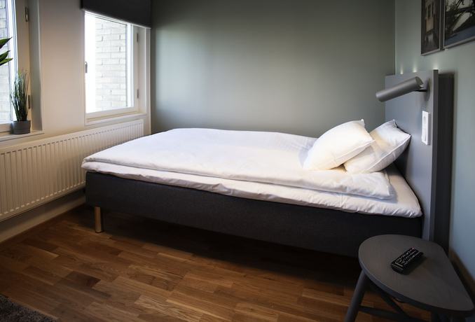 Imagen de la habitación del Hotel The Studio Hotel. Foto 8