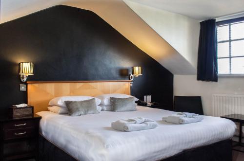 Imagen de la habitación del Hotel The Studley. Foto 7