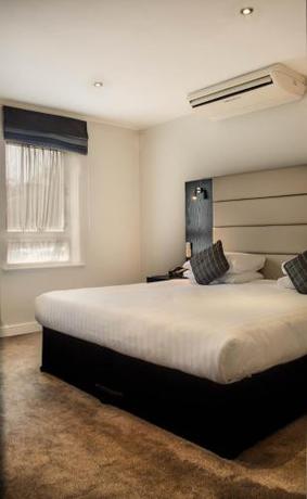 Imagen de la habitación del Hotel The Studley. Foto 10