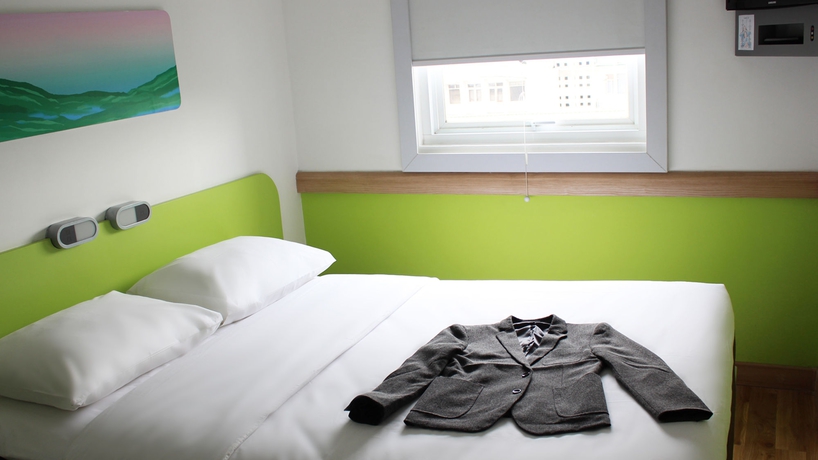 Imagen de la habitación del Hotel The Suddha Asia Afrika Bandung. Foto 6
