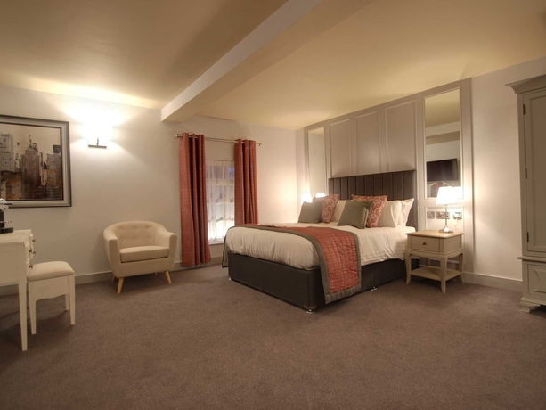 Imagen de la habitación del Hotel The Suffolk. Foto 2