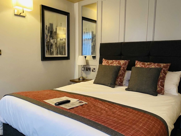 Imagen de la habitación del Hotel The Suffolk. Foto 3